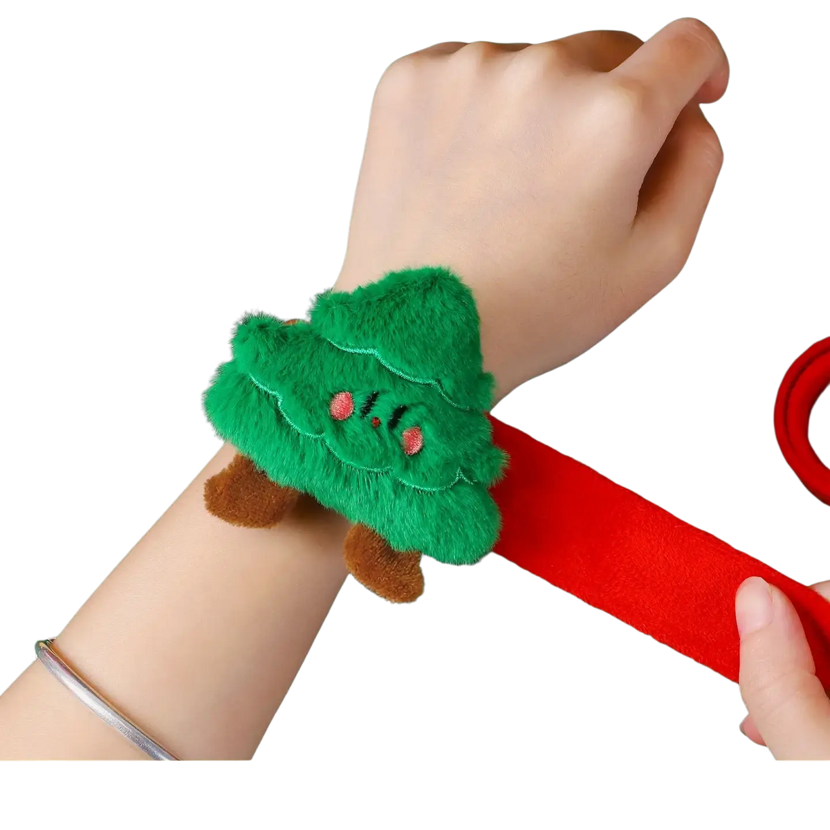 Plush christmas slap bracelet for kids featuring a green tree-shaped plush figure with pink eyes and red elastic strap