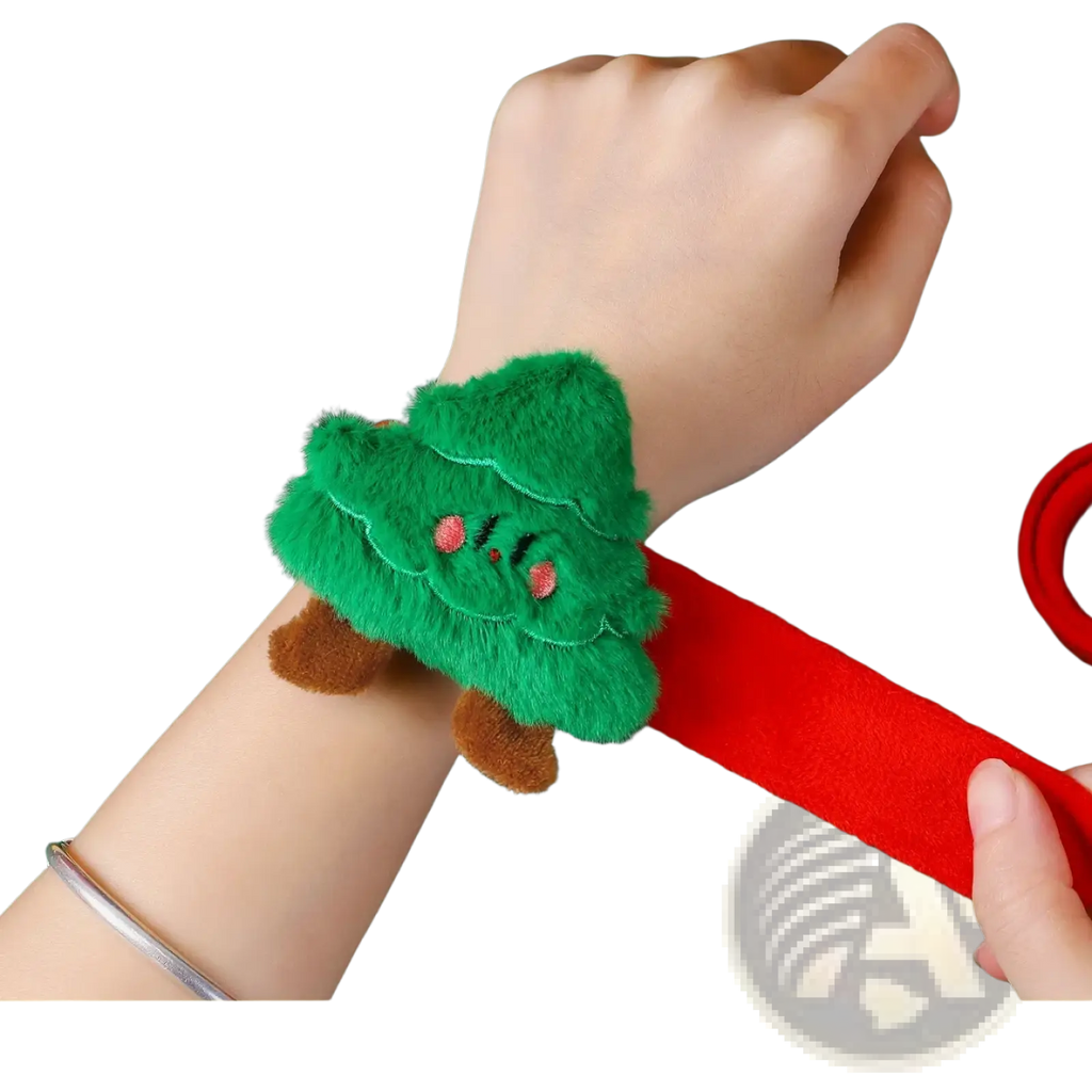Plush christmas slap bracelet for kids featuring a green tree-shaped plush figure with pink eyes and red elastic strap