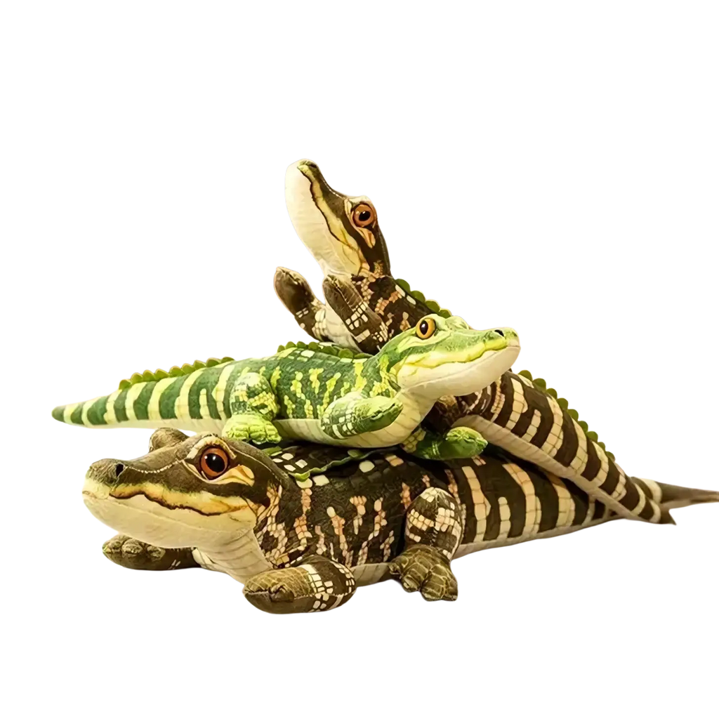 Three plush crocodile stuffed animal toys with green and brown patterned fabric and detailed stitched scales and eyes
