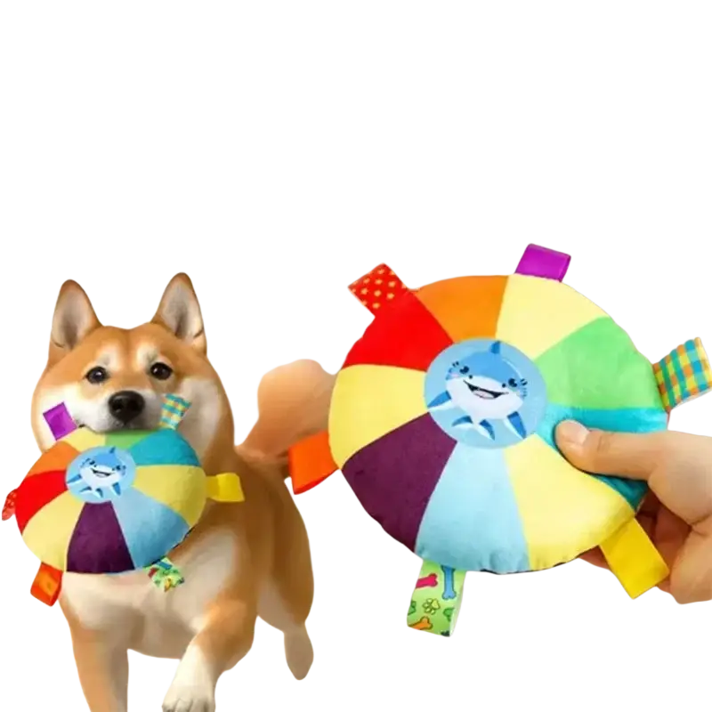 Colorful plush dog ball toy with smiling shark face and fabric grab tabs for outdoor training of furry children
