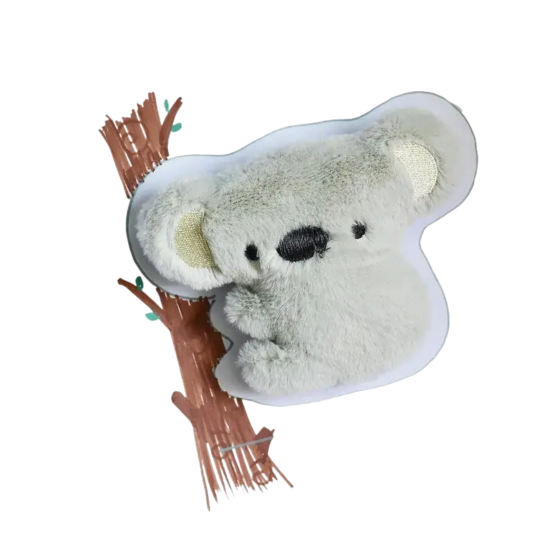 A soft light gray plush koala interactive dog toy with embroidered eyes and textured fabric body for squeaking play