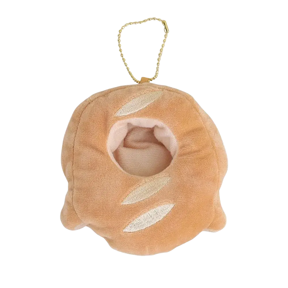 Soft tan plush baguette-shaped keychain with white embroidered slashes and gold chain for plush doll headgear animal costume
