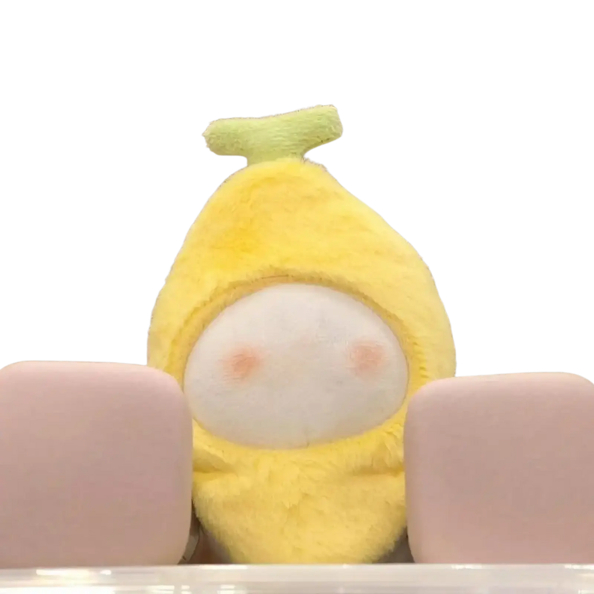 Plush doll headgear animal costume 10cm showing a soft yellow banana-shaped plush toy with light green stem and rosy cheeks