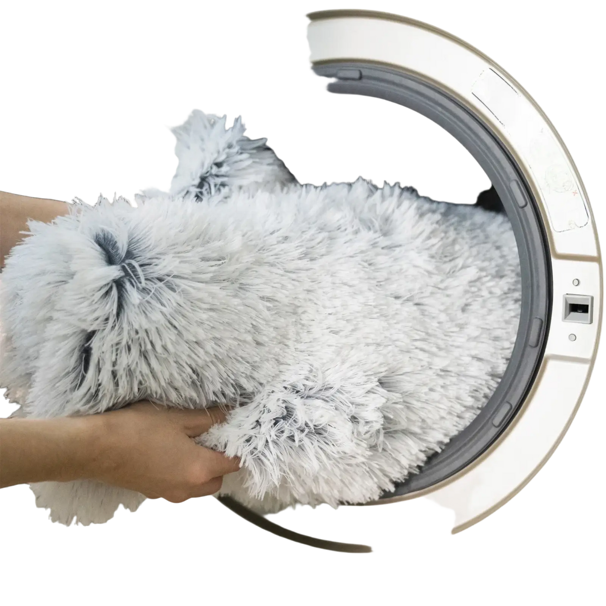A plush white and gray fluffy dog bed sofa made of soft faux fur with a shaggy texture for warmth and comfort