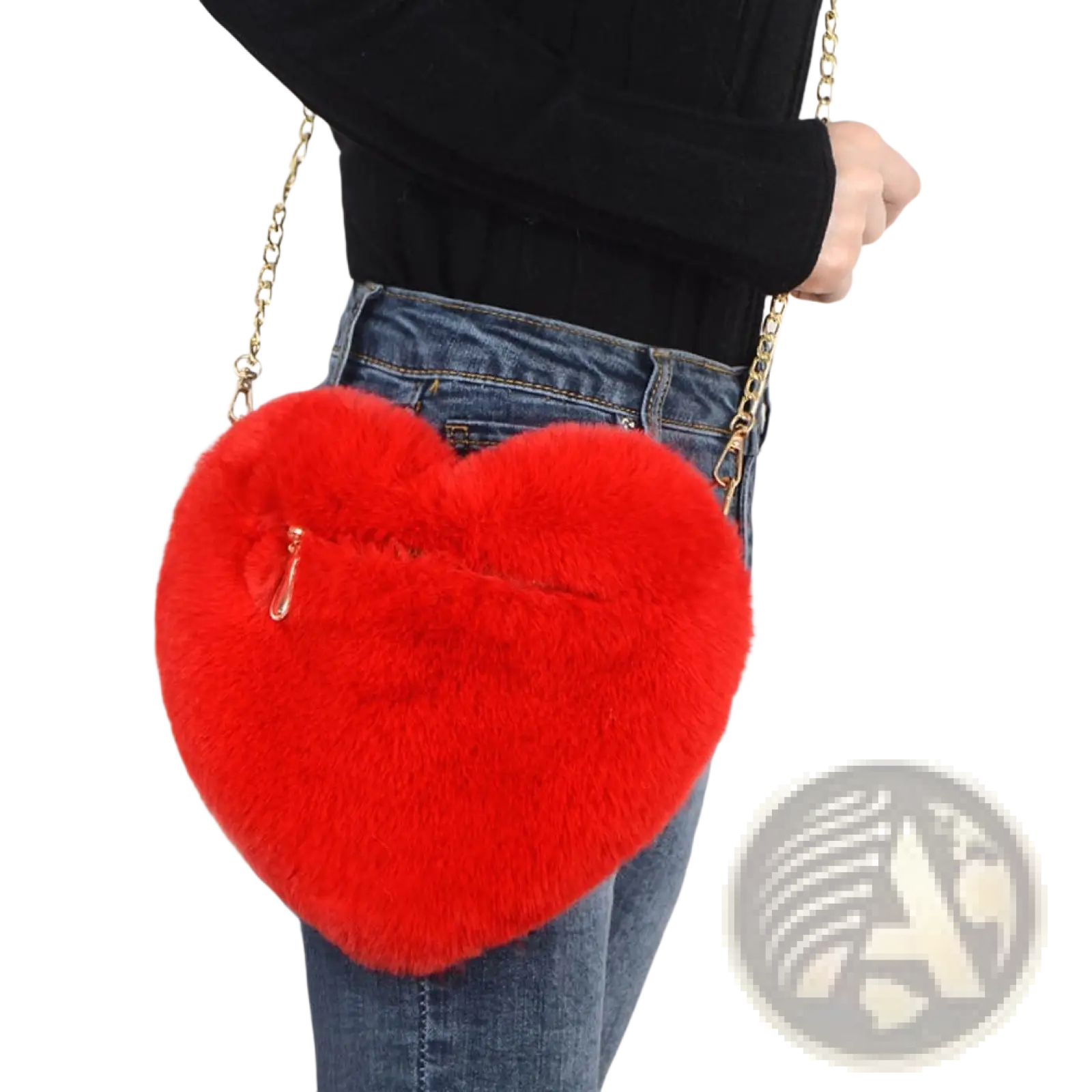 A vibrant red plush faux fur heart shaped crossbody bag with gold chain strap and zipper closure
