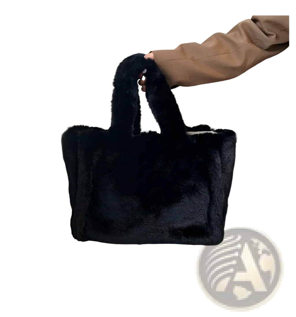 Black plush faux fur tote bag with soft texture and sturdy handles featuring a chain strap shoulder design