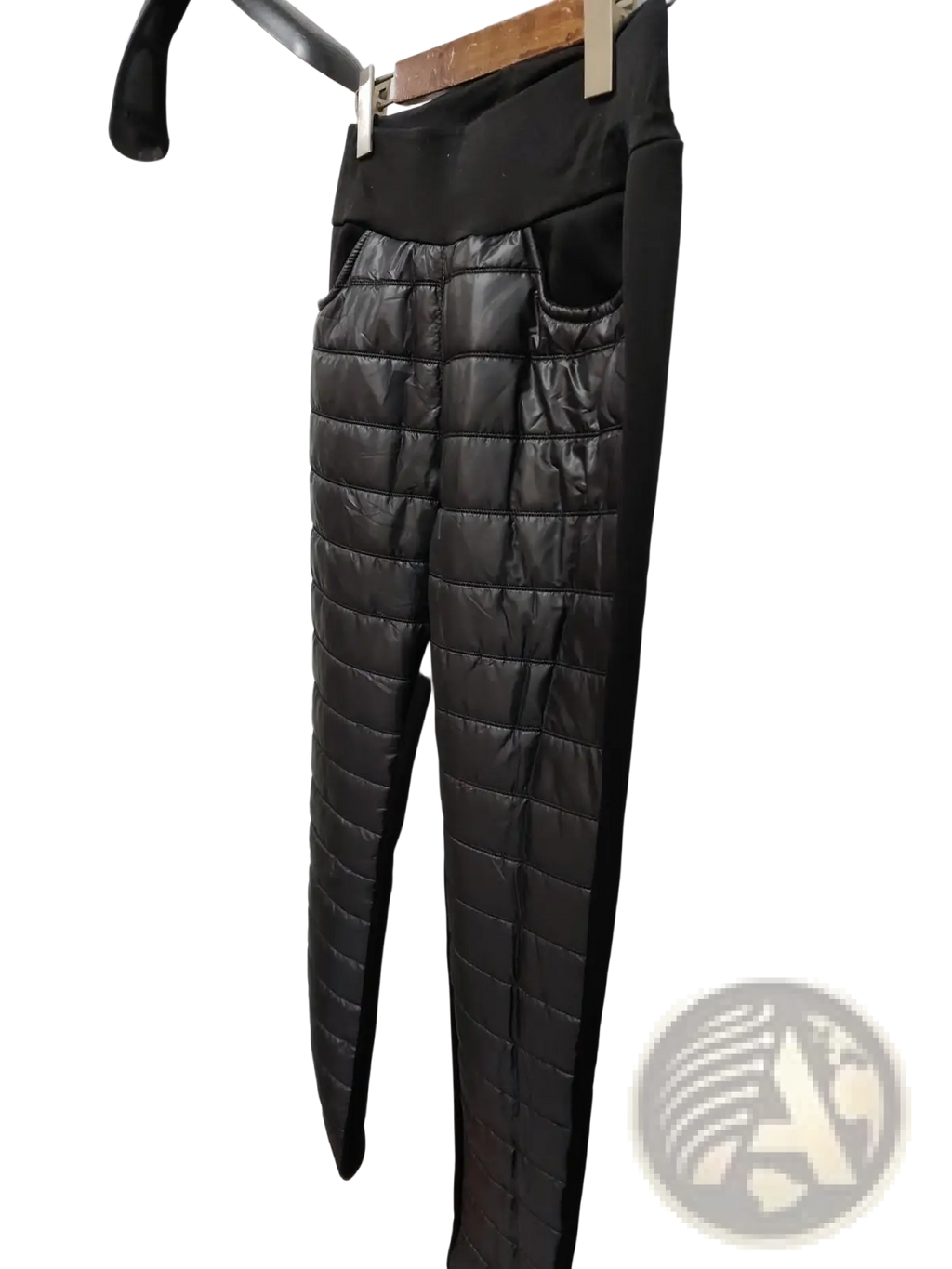Black quilted plush fleece lined high waist winter pencil pants with elastic band and side pockets for cold weather