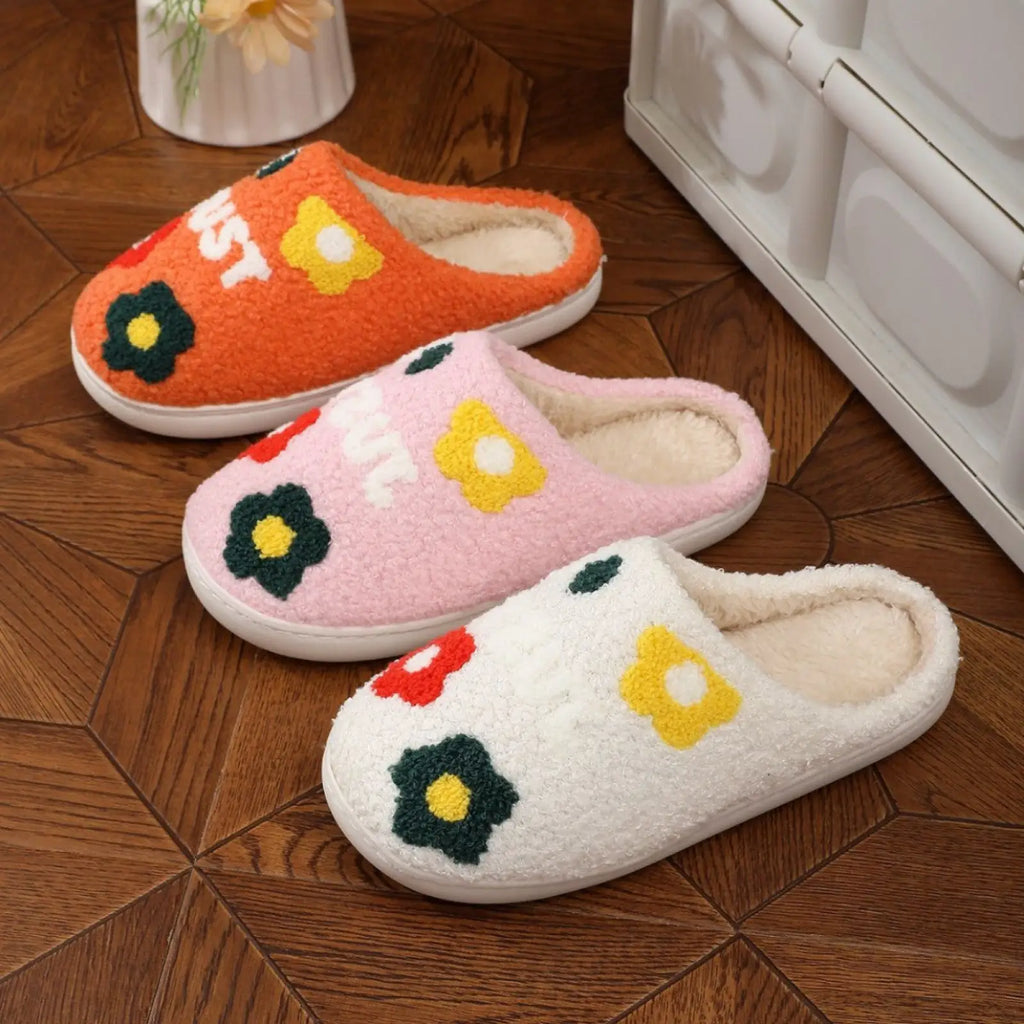 Three cozy plush floral cotton slippers in orange pink and white with soft TPR sole and colorful embroidered flowers