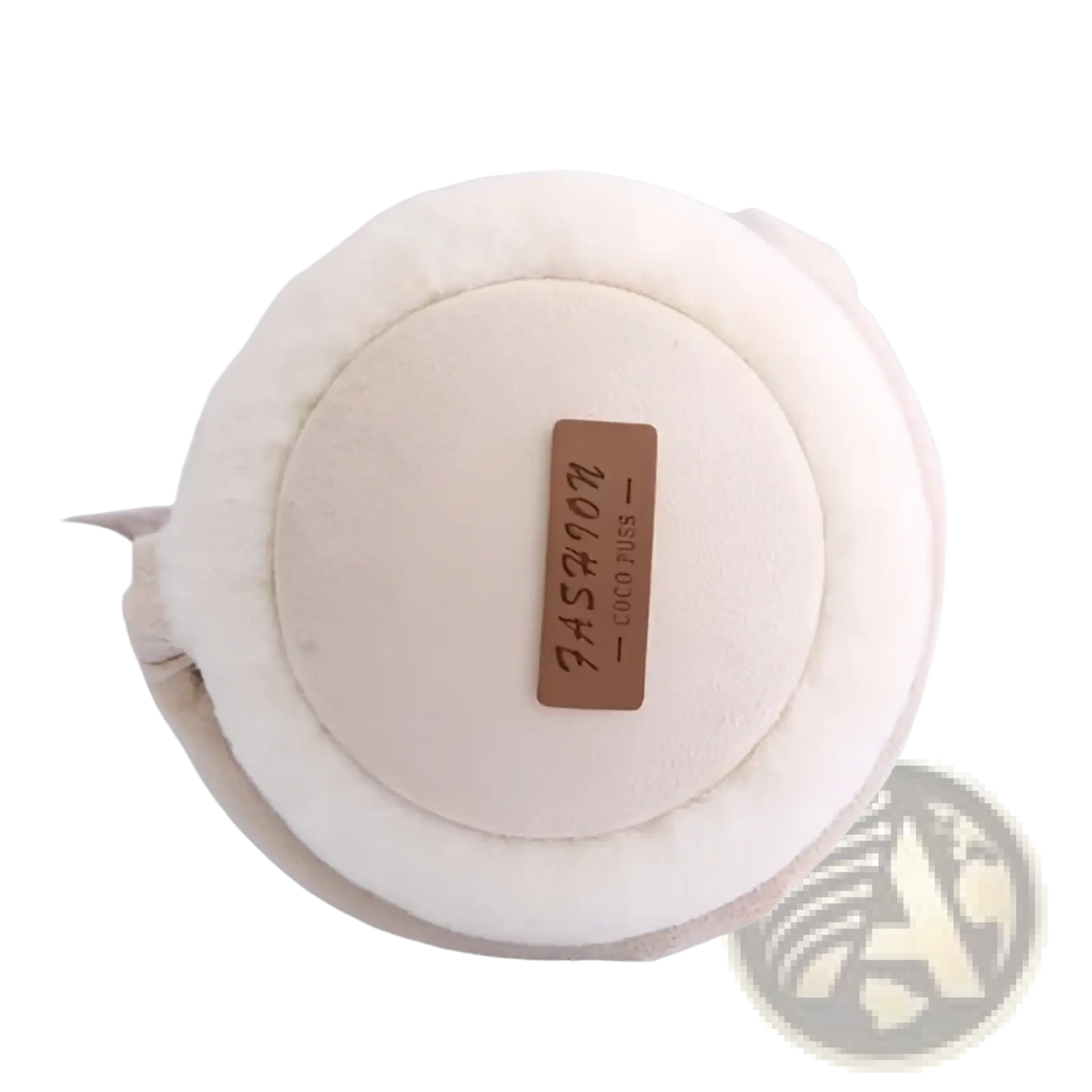 Cream-colored plush foldable bluetooth winter earmuffs with stereo sound featuring soft rounded design and leather tag