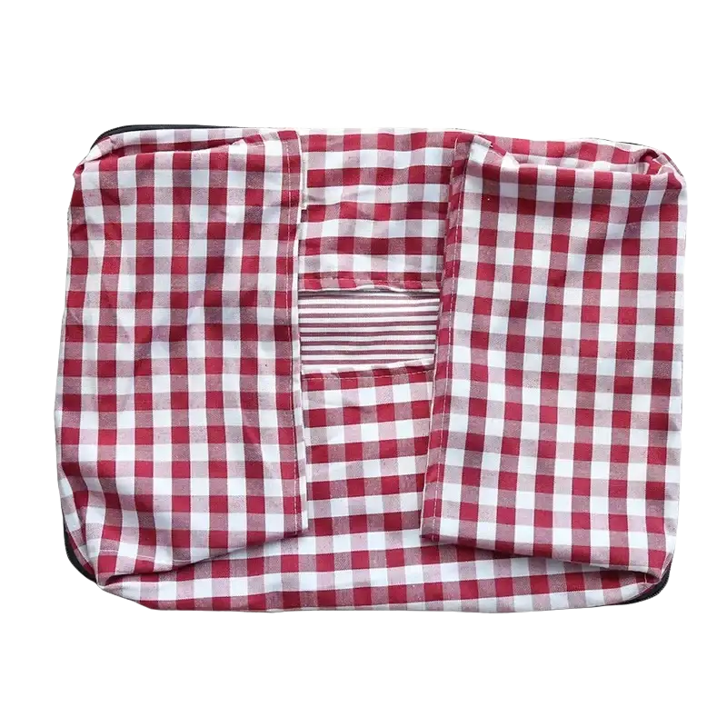 Plush gingham check pet bed with red and white checkered cotton fabric and central pocket with striped lining