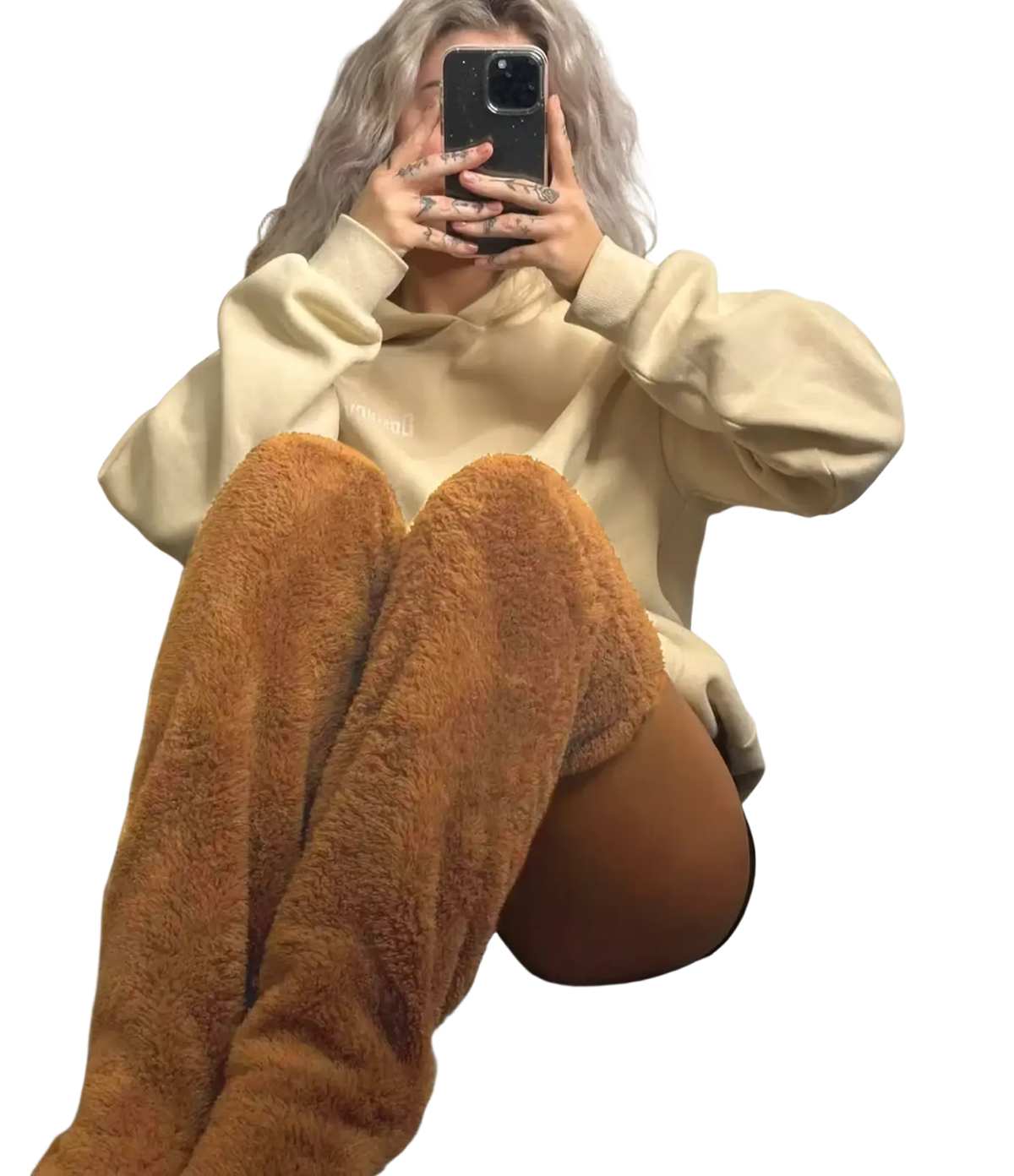 Tan fuzzy over-the-knee boots featuring plush cashmere material designed as knee high socks and fuzzy leg warmers