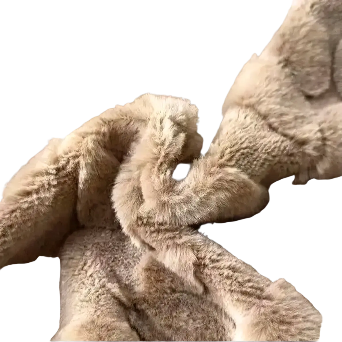 Beige faux fur blanket with plush textured surface and raised circular patterns complementing plush leaf embroidered throw pillow covers