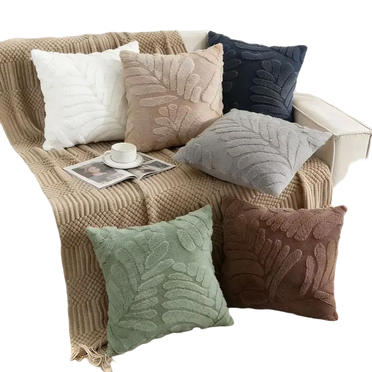 A cozy collection of plush leaf embroidered throw pillow covers in earthy tones with soft textured fabric