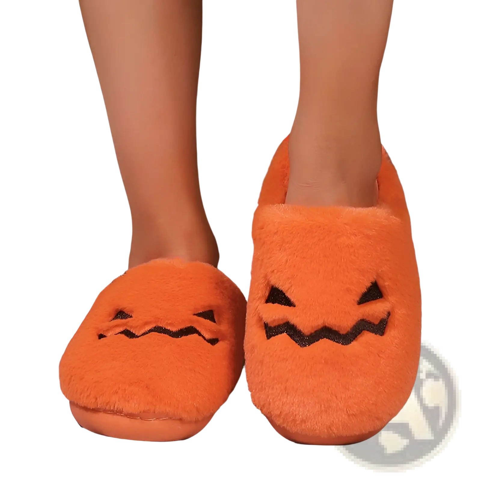 Plush pumpkin Halloween indoor slippers in orange fuzzy fabric with black embroidered facial features