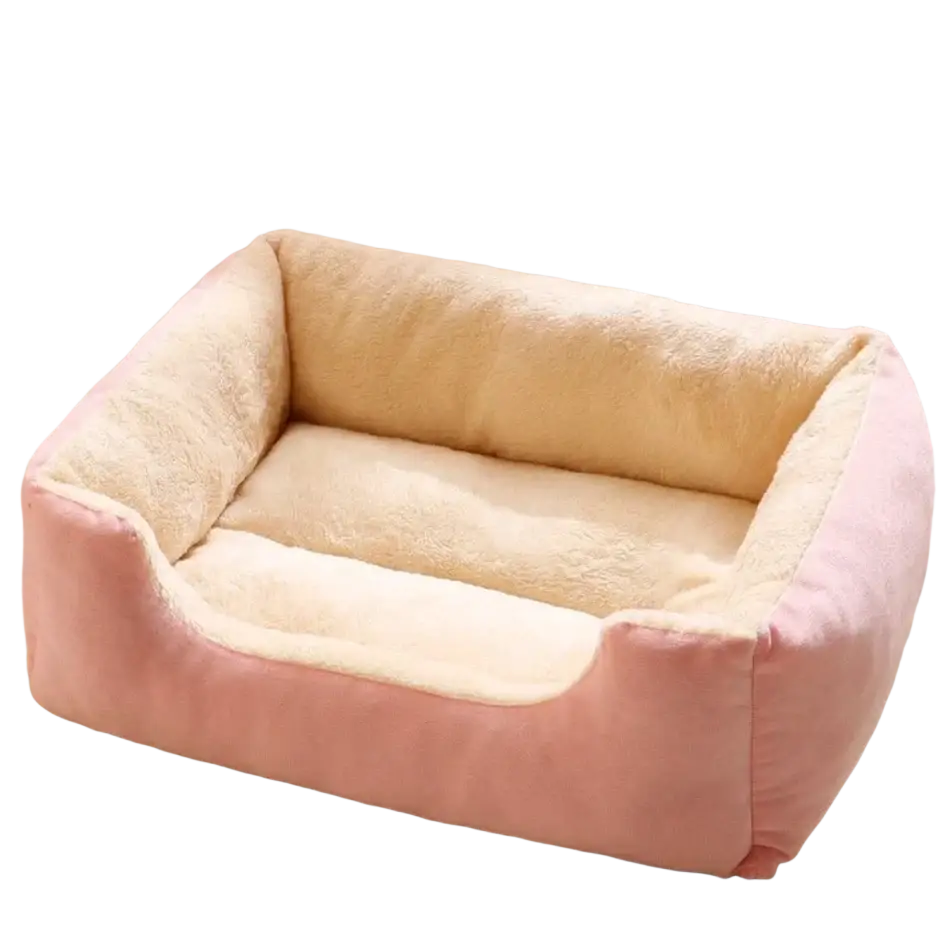 Plush rectangular cat bed in pink and cream with soft cushioned sides and cozy interior for pet comfort