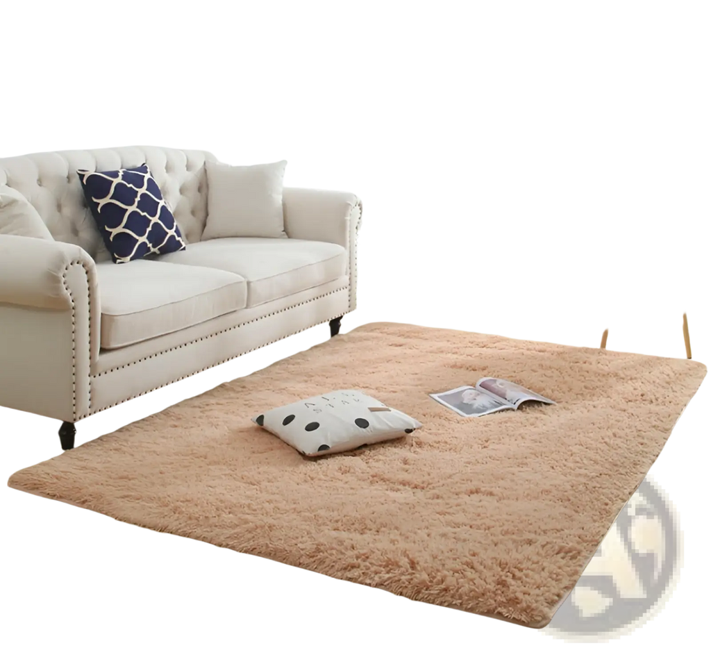 A plush peach-colored shaggy area rug with soft fluffy texture and slightly raised edges in machine washable faux fur