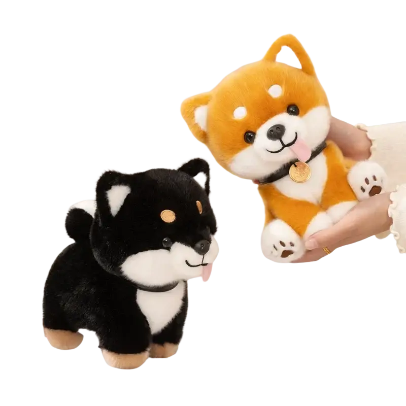 Adorable orange and white plush Shiba Inu dog stuffed animal toy with gold-colored tag held gently in hand