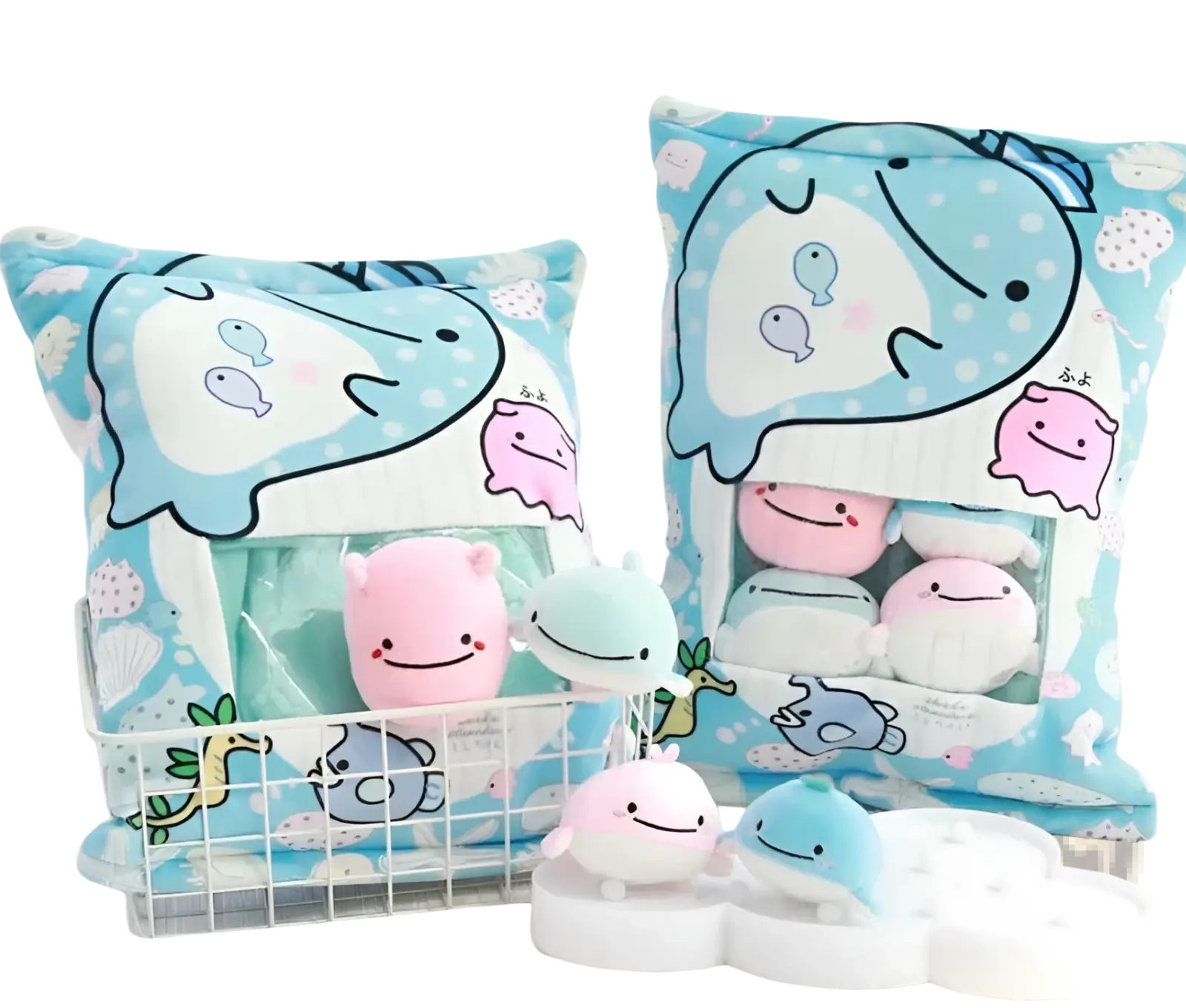Blue and white whale-themed plush snack bag pillow with transparent front pocket holding eight small stuffed toys