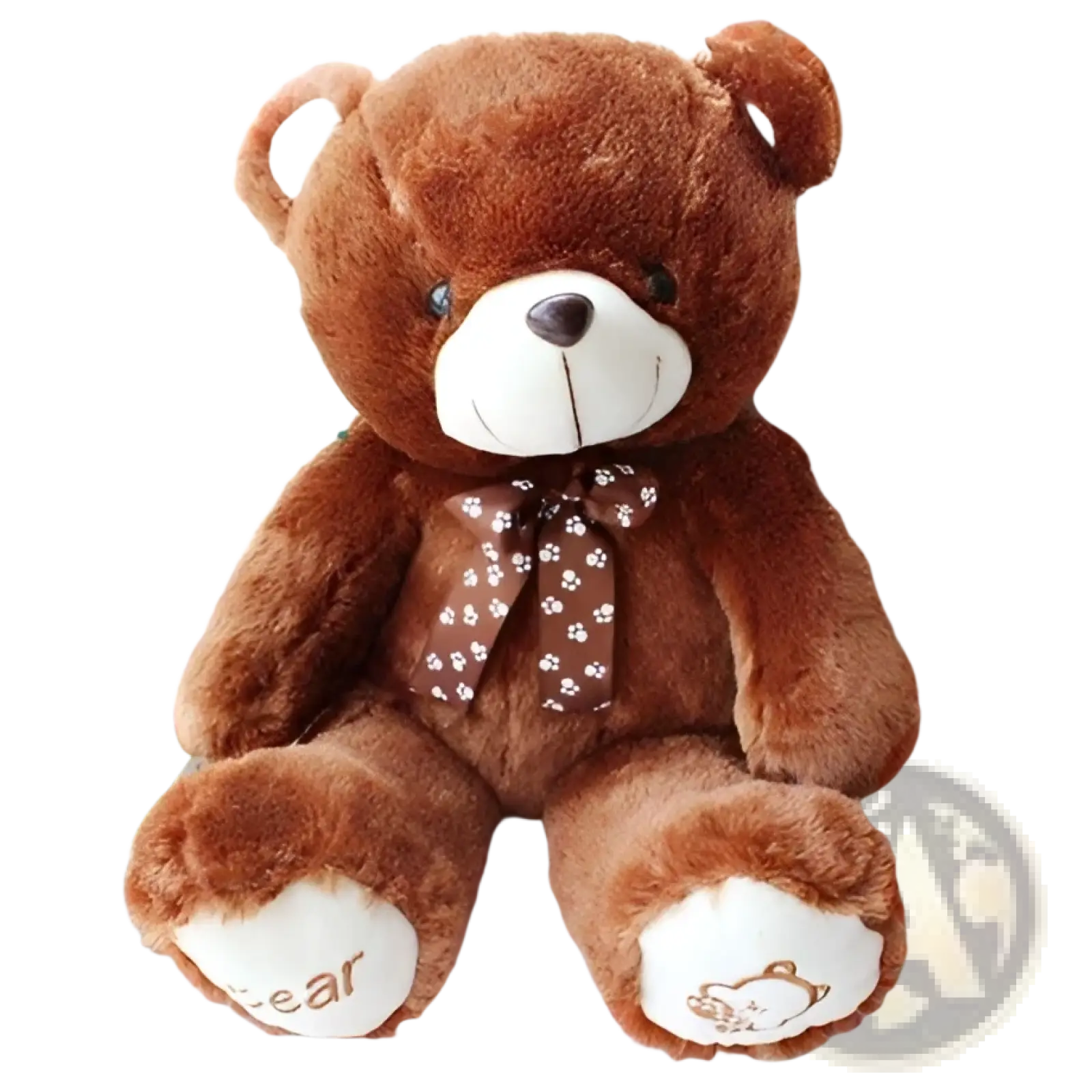 A plush teddy bear soft animal doll in brown with white snout black button eyes and a polka-dotted bow tie