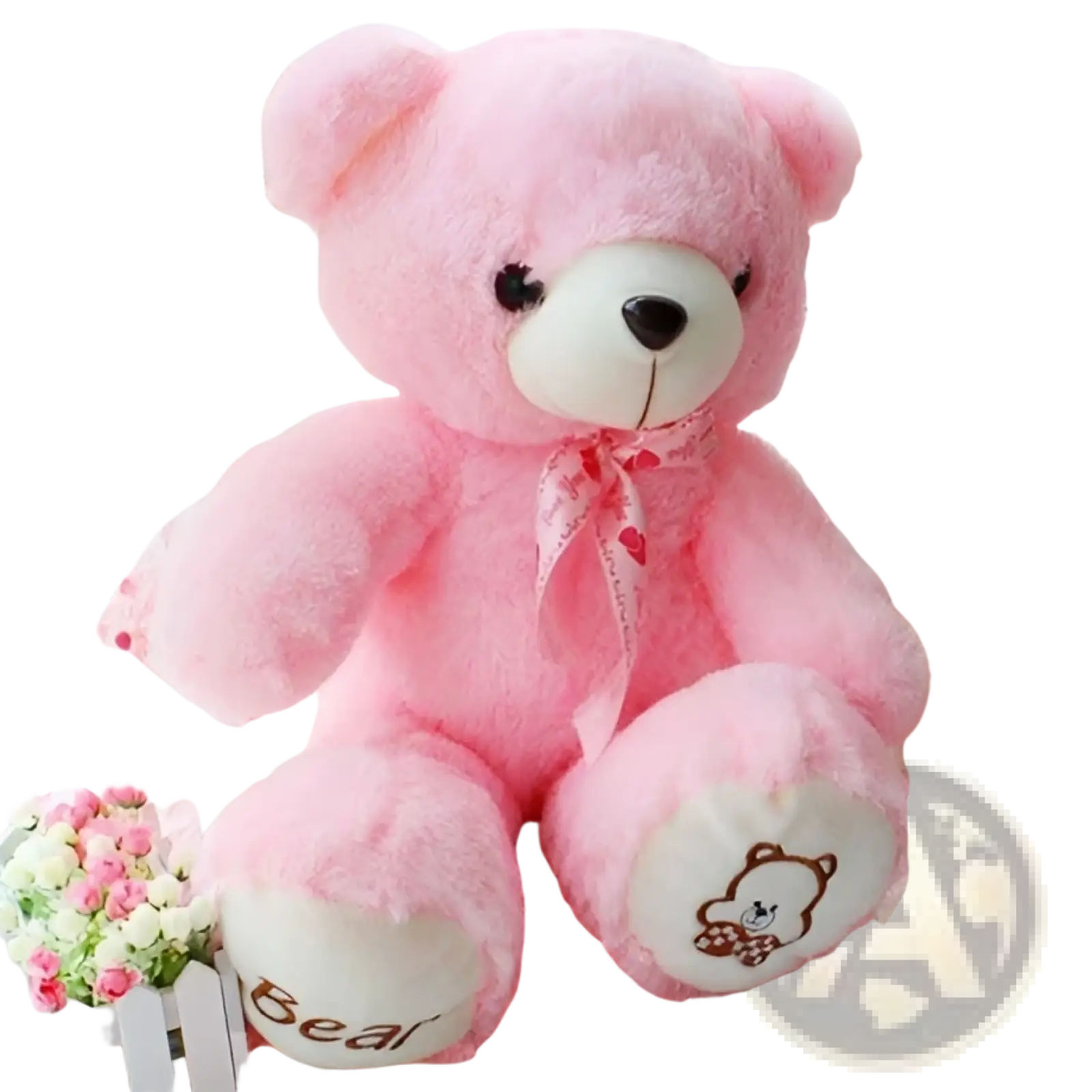 Plush teddy bear soft animal doll in pink with white paws and a red ribbon bow tie around its neck