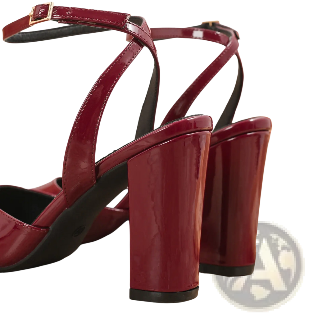 Pointed toe ankle strap chunky heel pumps in burgundy patent leather with strappy design and gold-tone buckle detail