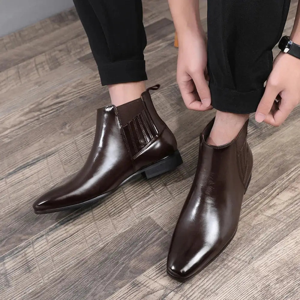 Men’s formal pointed toe leather Chelsea boots in polished dark brown with elastic side panels for easy wear