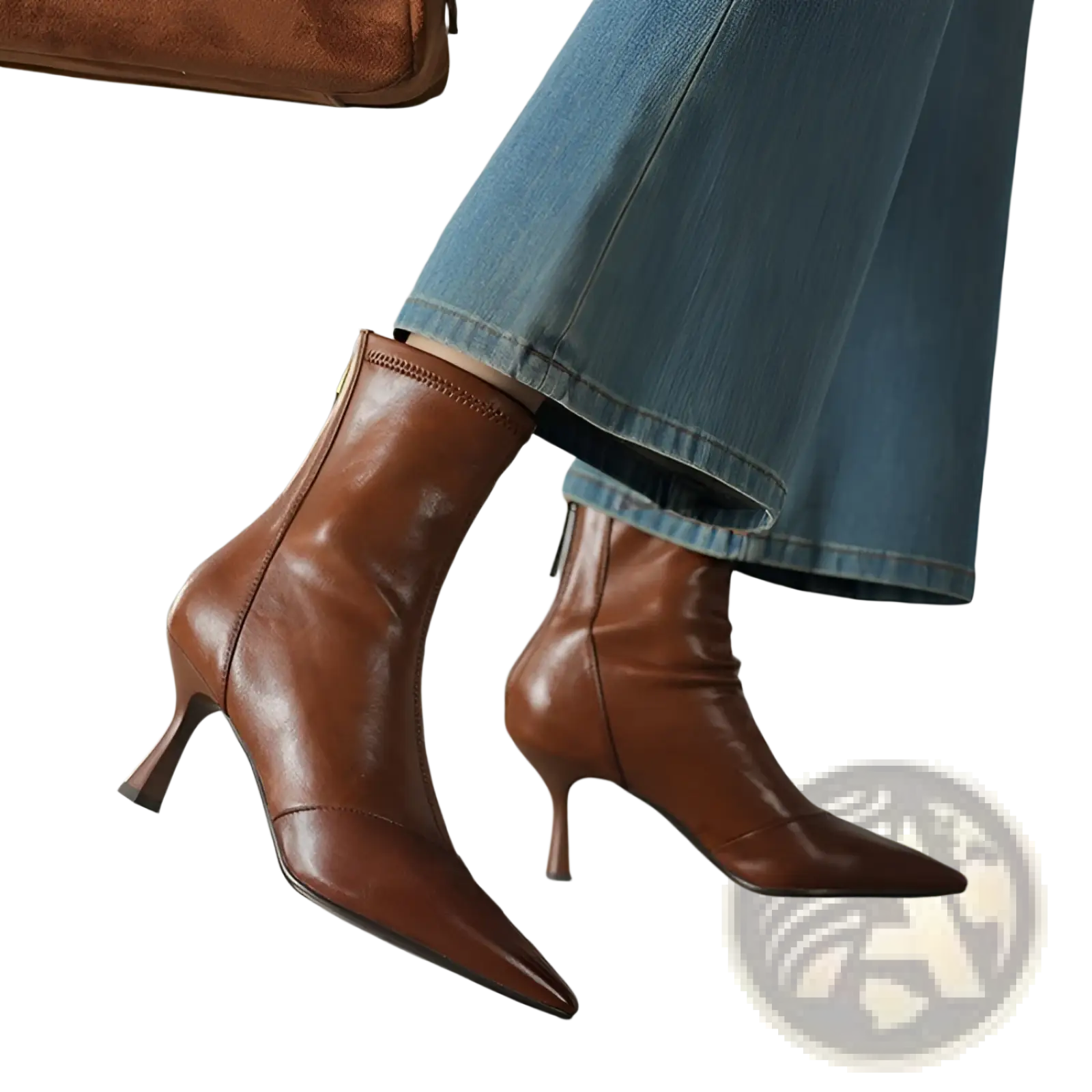 Brown cowhide leather ankle boots with pointed toe, slim stiletto heel, and side zipper closure