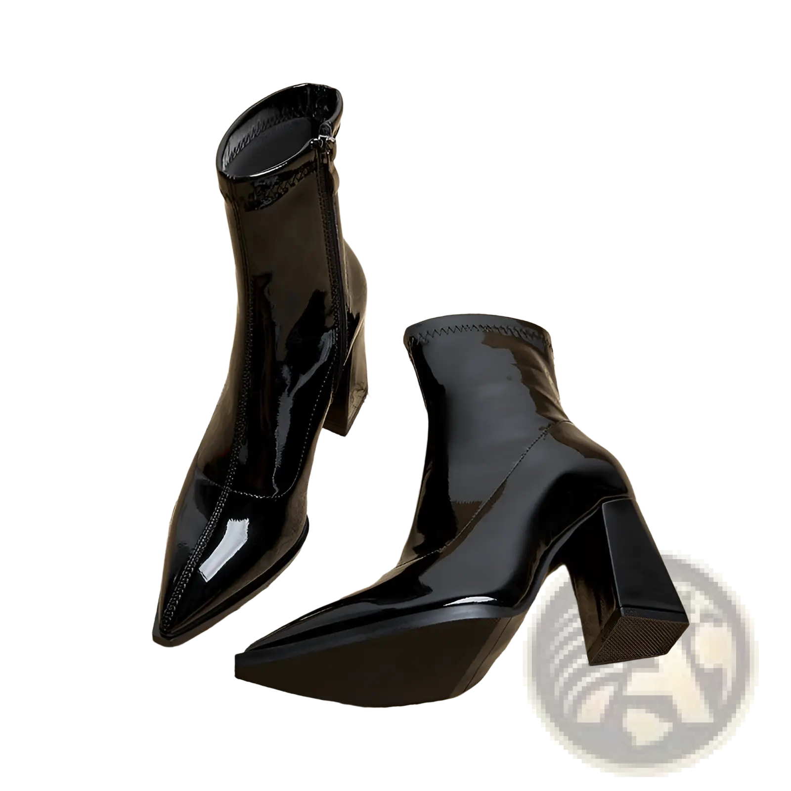 Black patent leather ankle boots with pointed toe and block heel shown from the back side