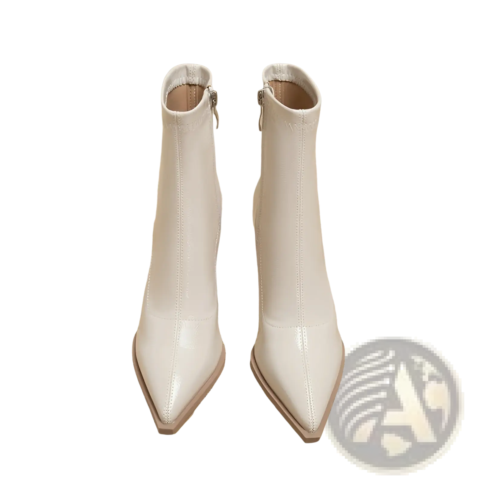 White patent leather ankle boots with pointed toe and zipper closure featuring block heel design