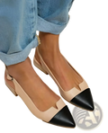 Beige and black two tone leather pointed toe slingback flats with a low heel for elegant casual wear
