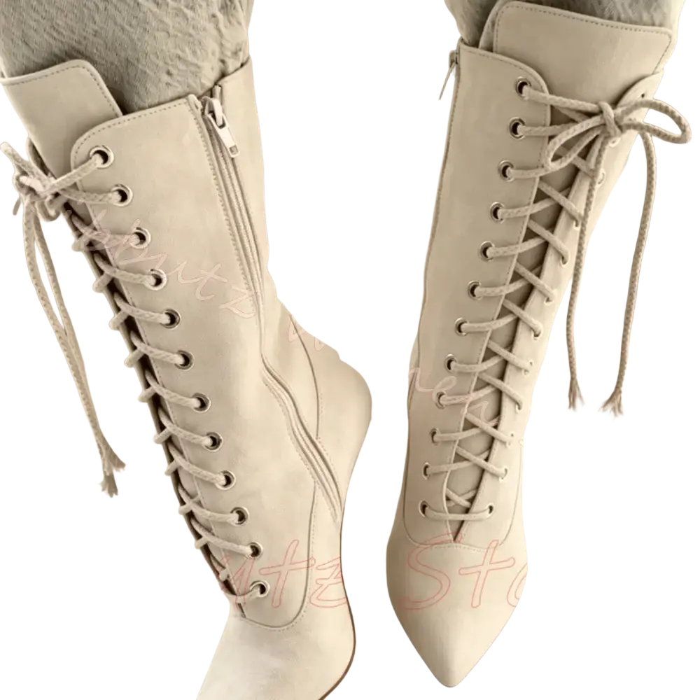 Cream-colored suede lace-up knee-high boots with pointed toe and high stiletto heel for women