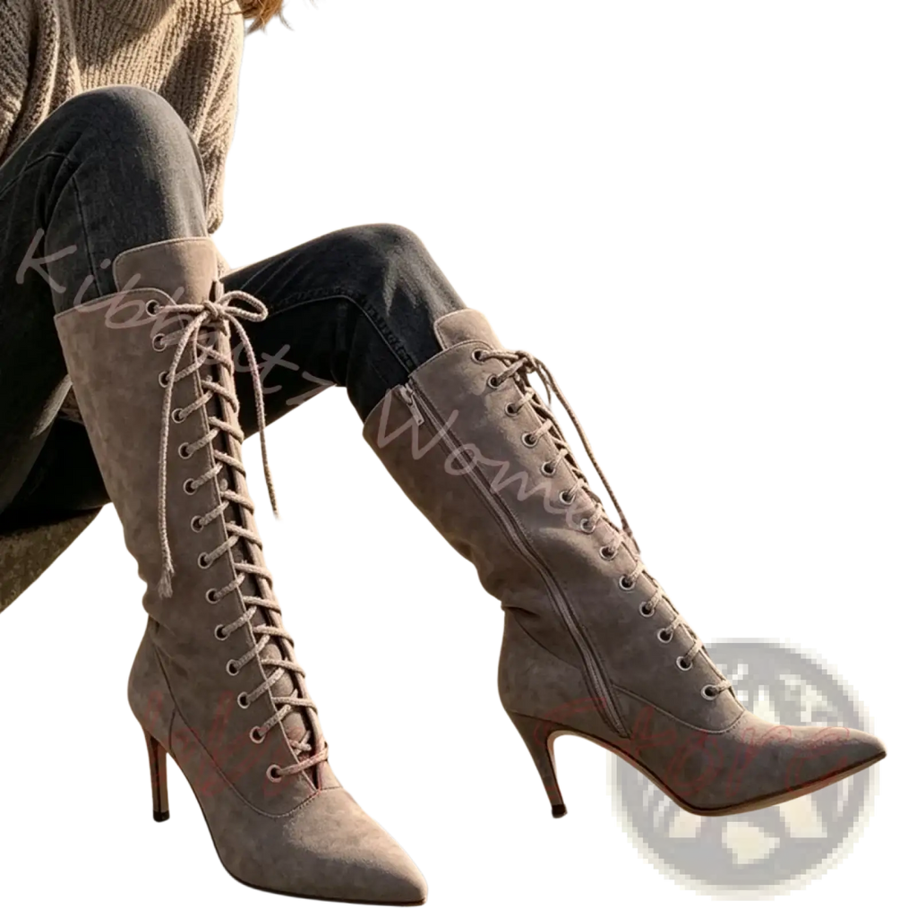 Gray suede knee-high boots with lace-up fronts and slender high heels complement pointed toe suede stiletto ankle boots