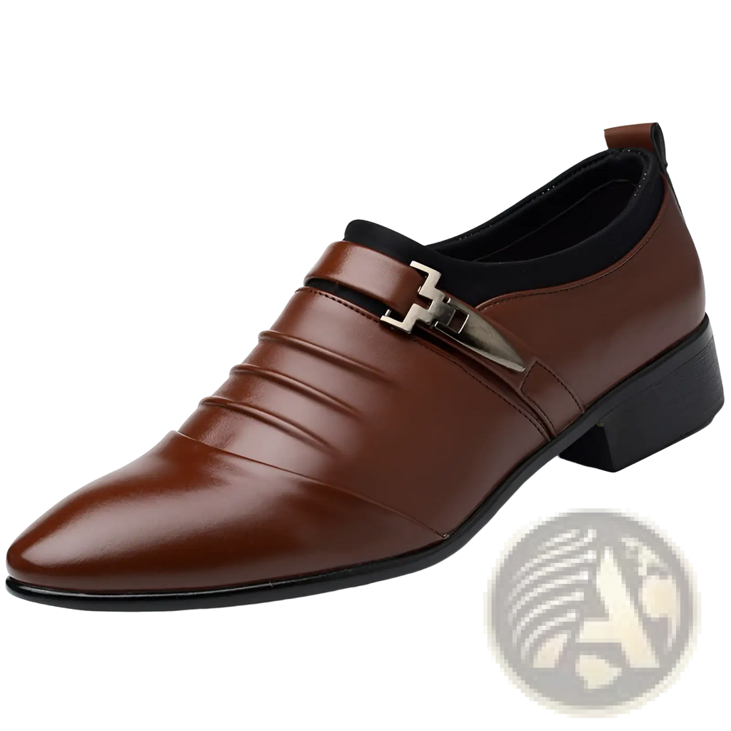 Brown leather pointed toe formal shoe with black sole and silver buckle strap across the vamp