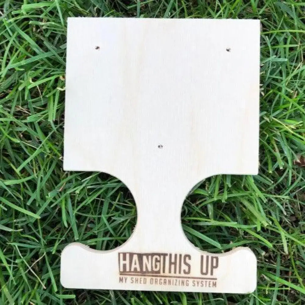 Light-colored wooden heavy duty wall mounted pole saw and pool skimmer hooks with t-shaped design and engraved text