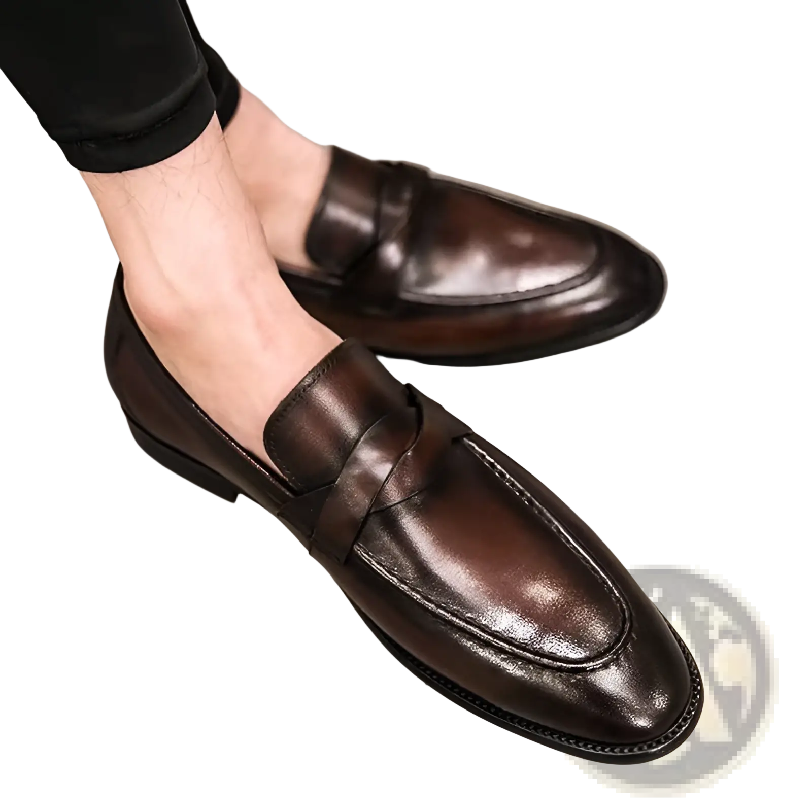 Polished dark brown leather British loafers with a classic slip-on design and detailed stitching