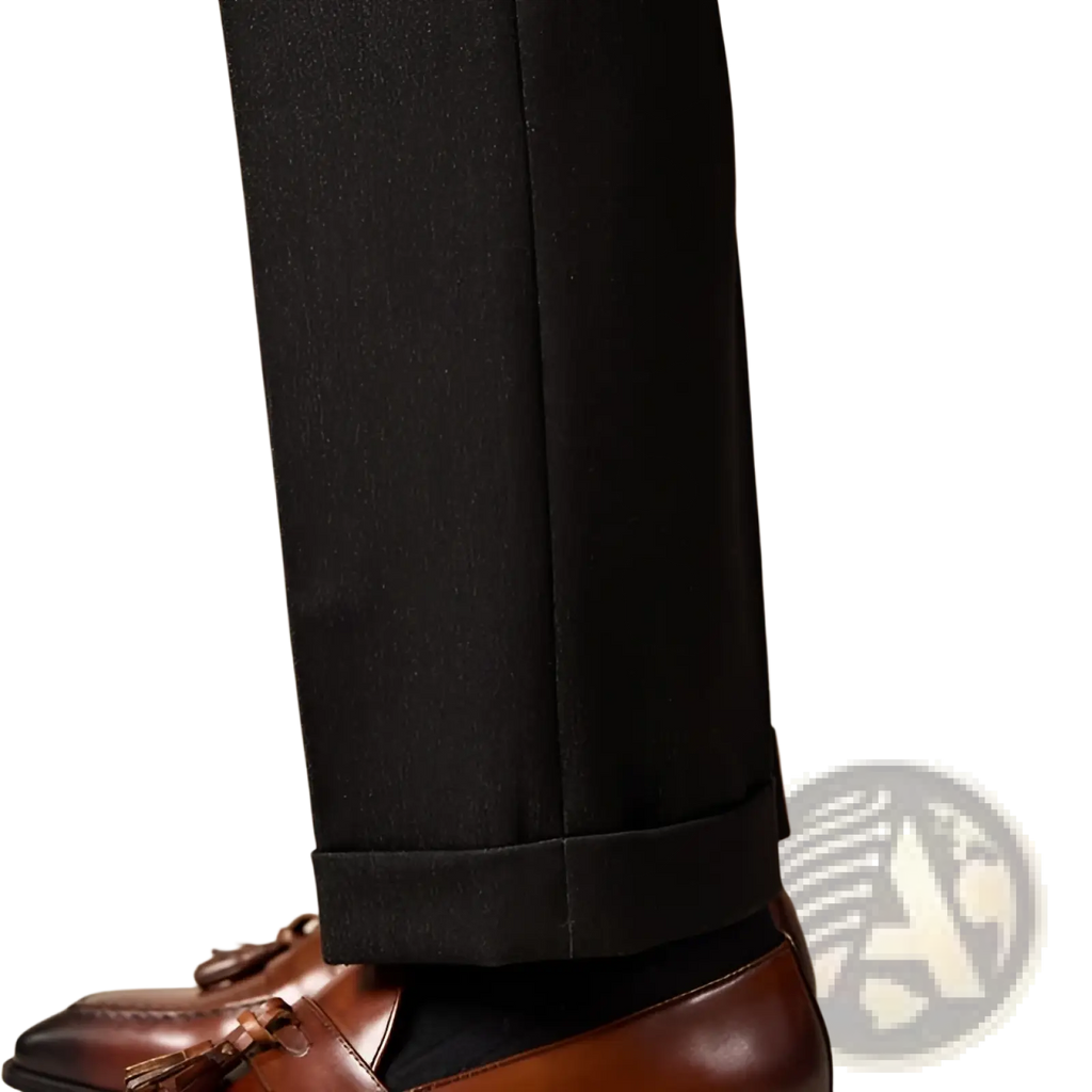 Black tailored trousers with subtle texture and cuffed hem paired with polished genuine leather brown tassel loafers