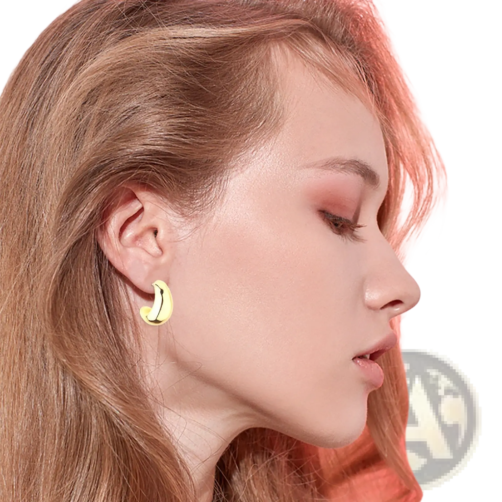 A sleek curved yellow polished gold twisted rope hoop earring with a smooth metallic finish
