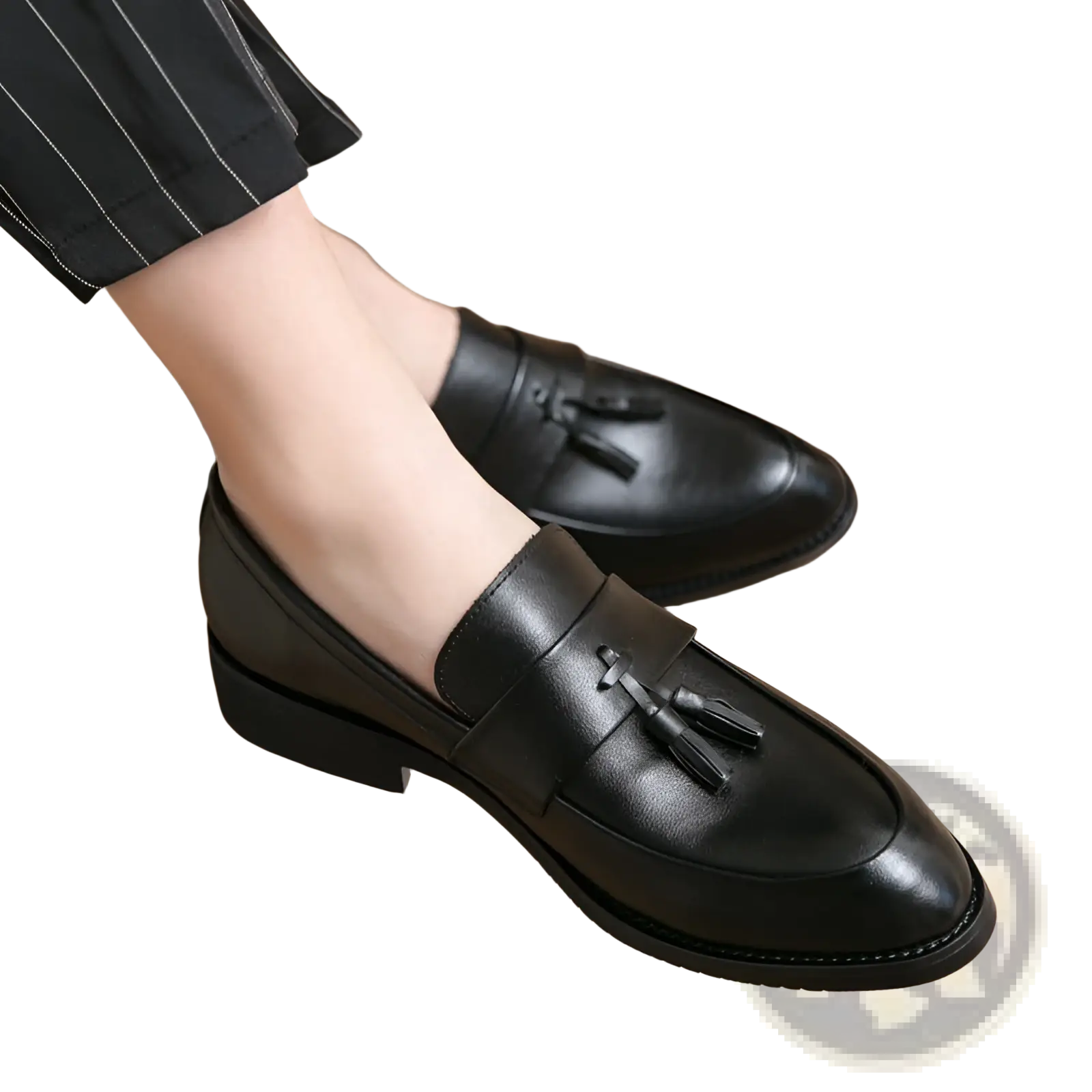 Black leather tassel loafers for men with polished finish and low heel perfect for formal occasions