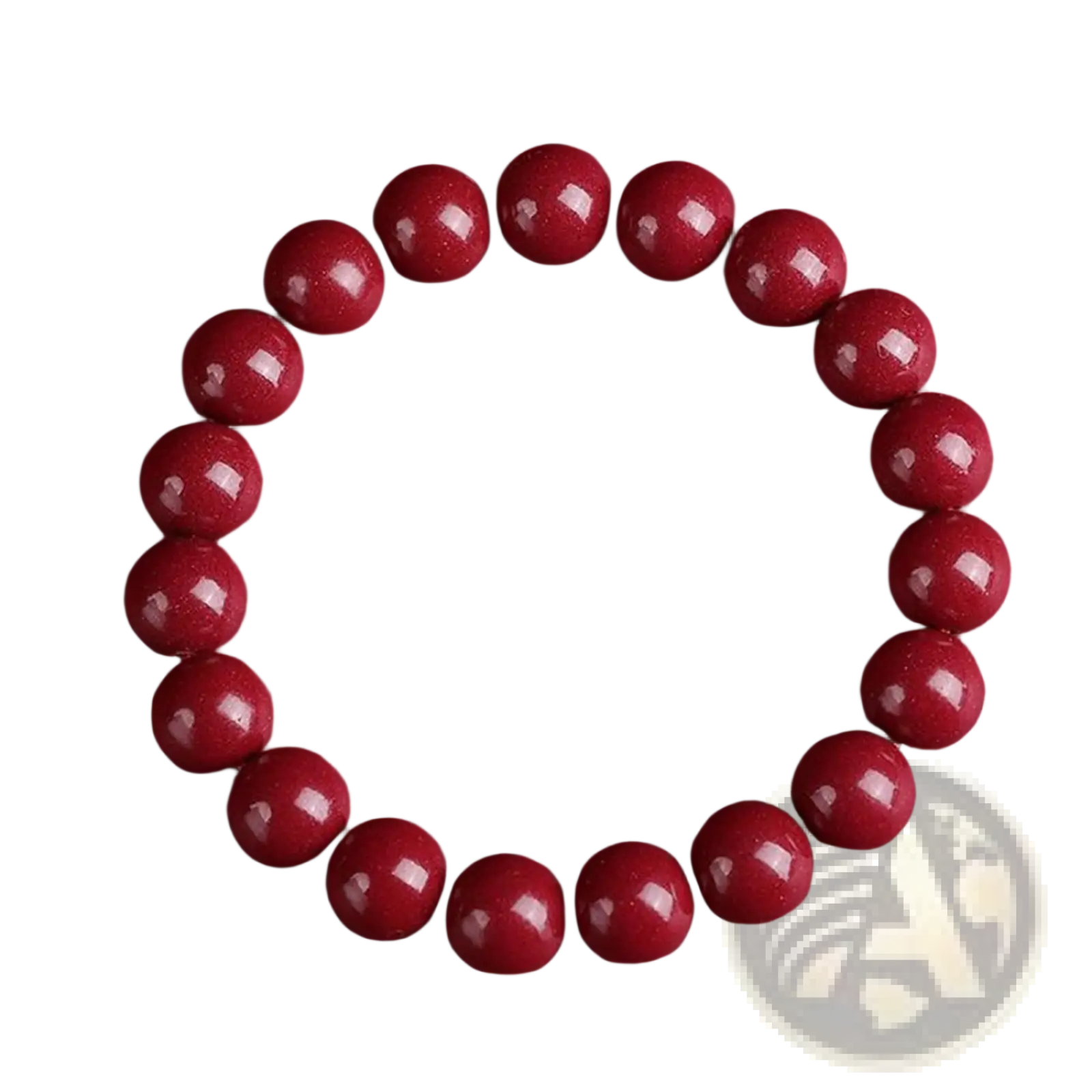 Polished red cinnabar bead bracelet featuring smooth glossy spherical beads arranged in a circular pattern