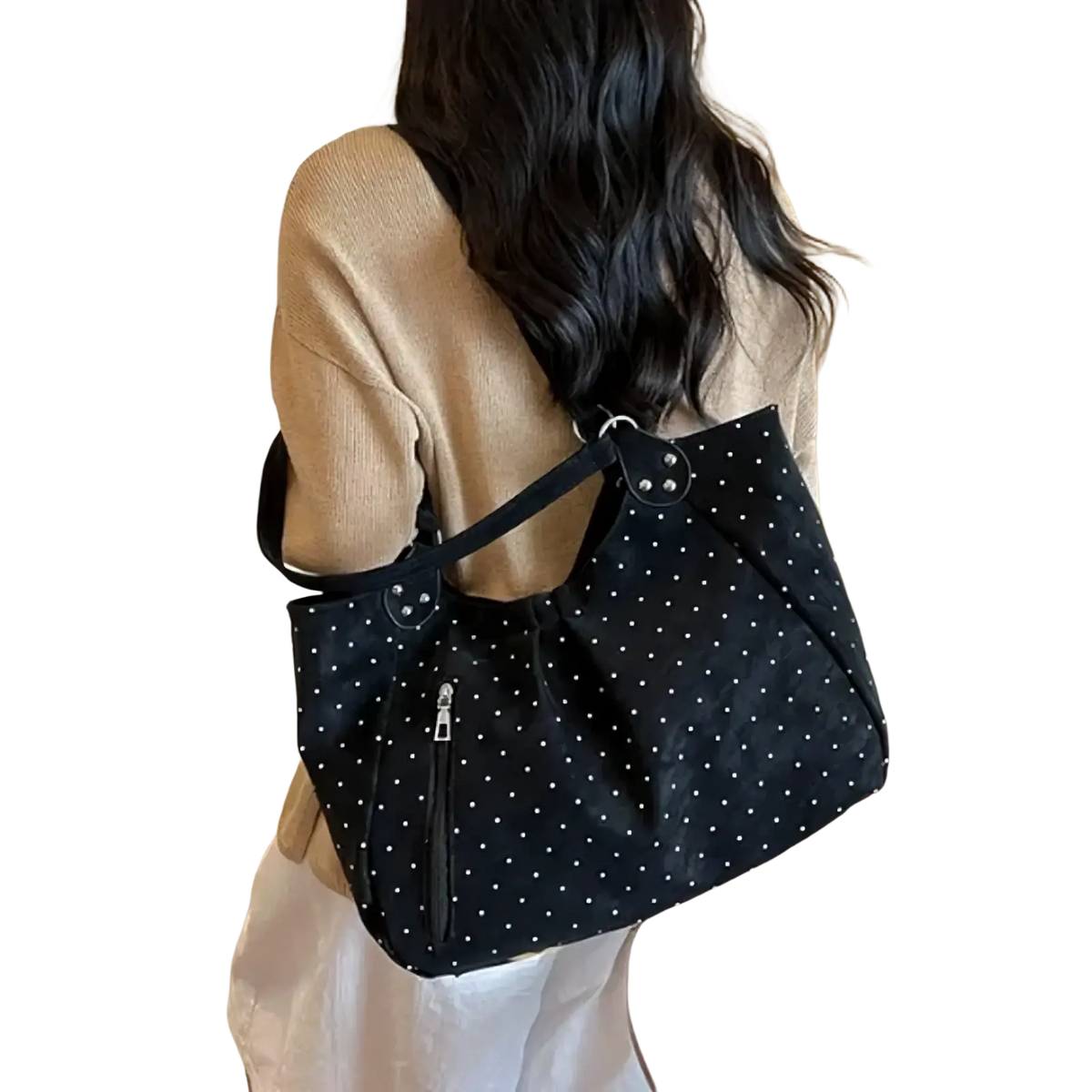 Black polka dot canvas tote bag with large capacity, silver toned hardware, and front zipper for convenient use