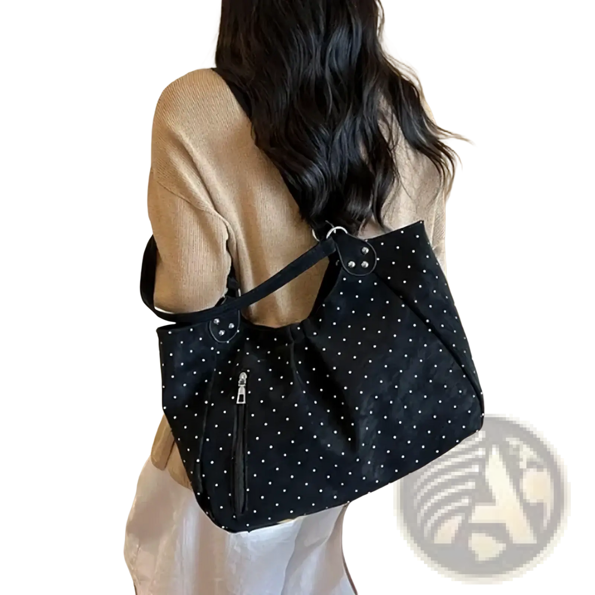 Black polka dot canvas tote bag with large capacity, silver toned hardware, and front zipper for convenient use