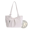 White polka dot canvas tote bag with large capacity, adjustable shoulder strap, and front zipper pocket