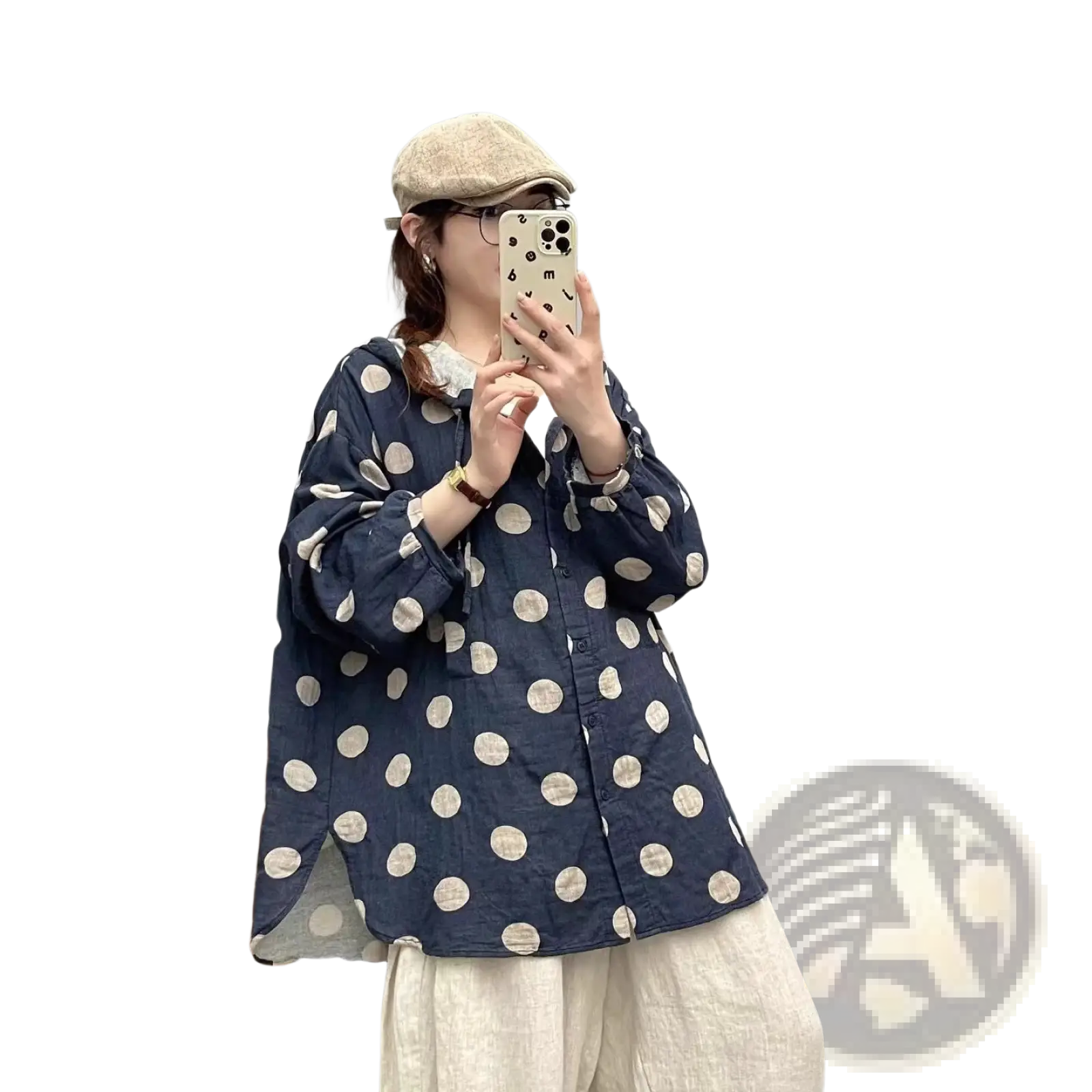 Polka dot cardigan hoodie in navy blue with large cream polka dots featuring a relaxed button-up blouse style