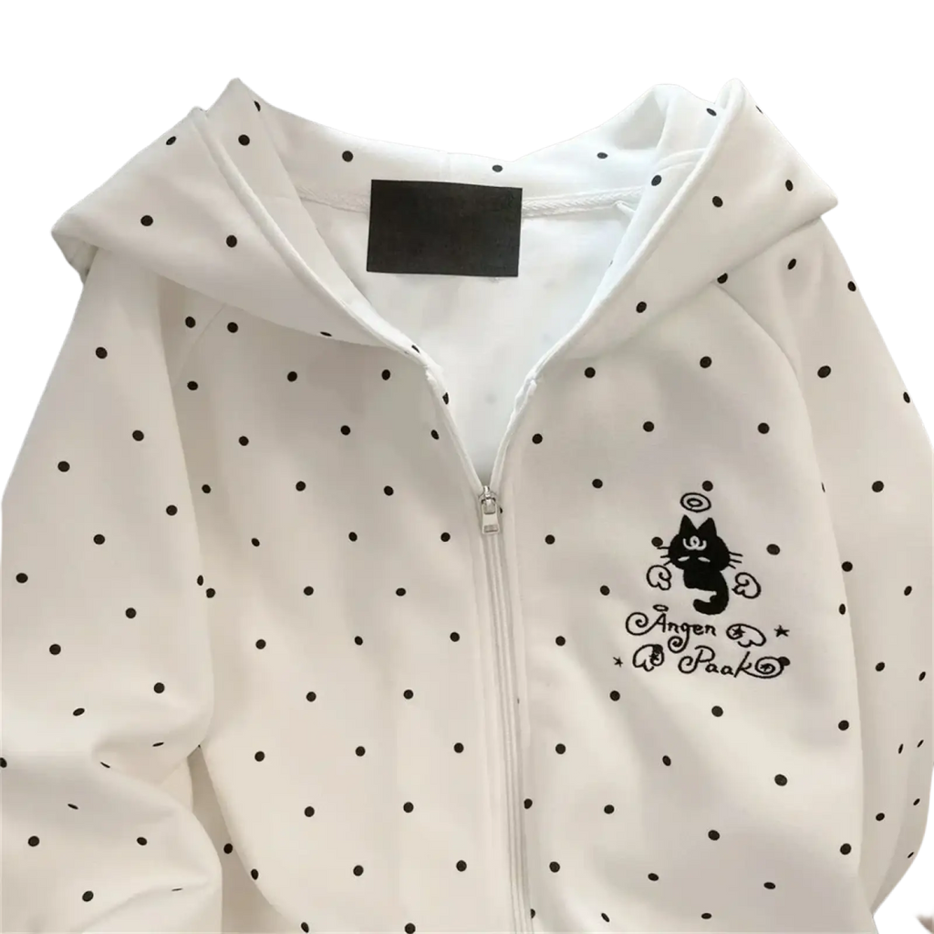 White zip-up hoodie with black polka dots and embroidered cat design on chest in polka dot cat zip hoodie kawaii preppy sweatshirt