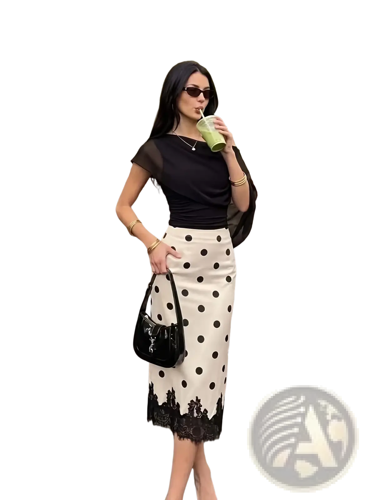 Black patent leather handbag with glossy finish and distinctive ysl logo paired with polka dot lace midi skirt