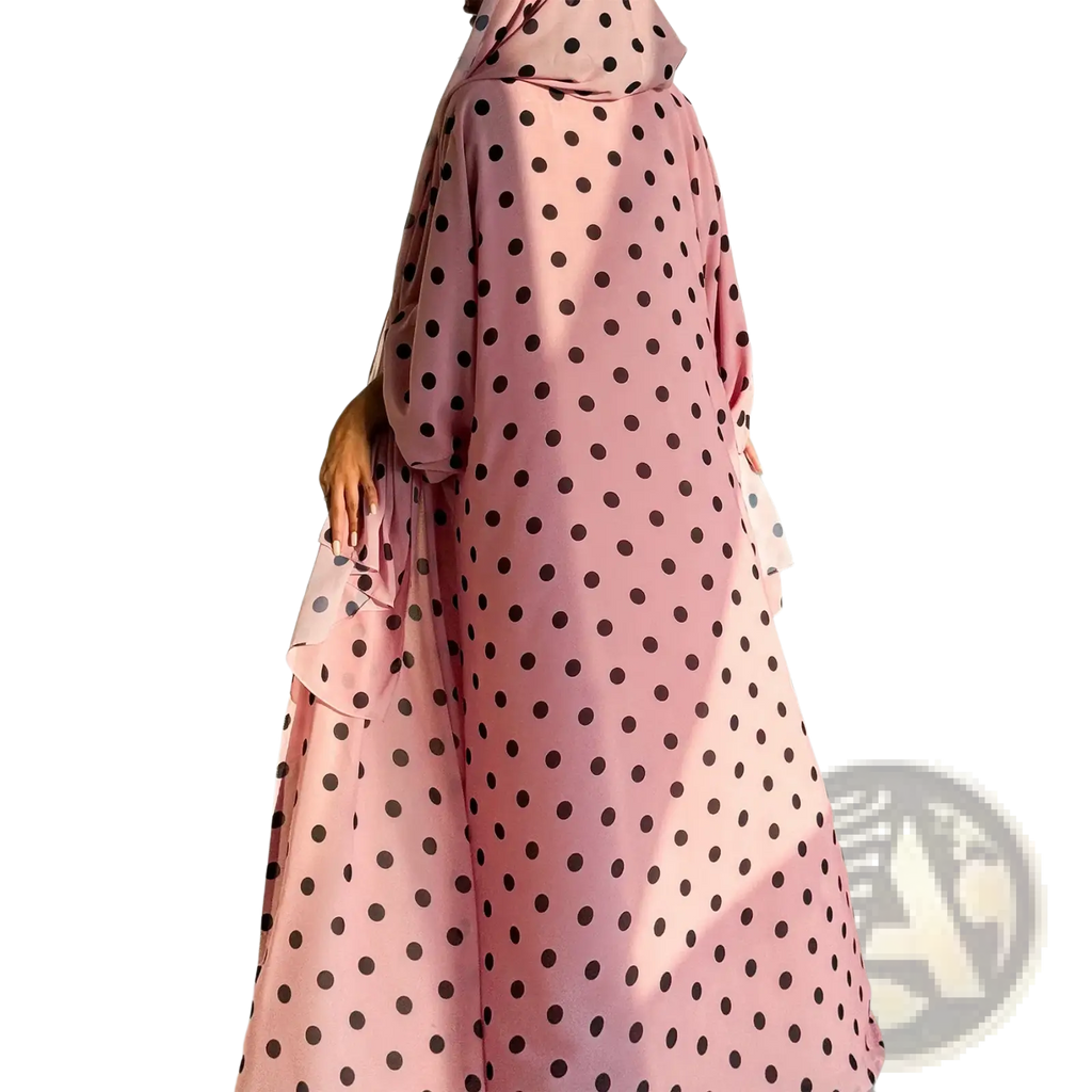 Pink polka dot Muslim abaya set by cpenga featuring a hijab dress suitable for Dubai style modest wear