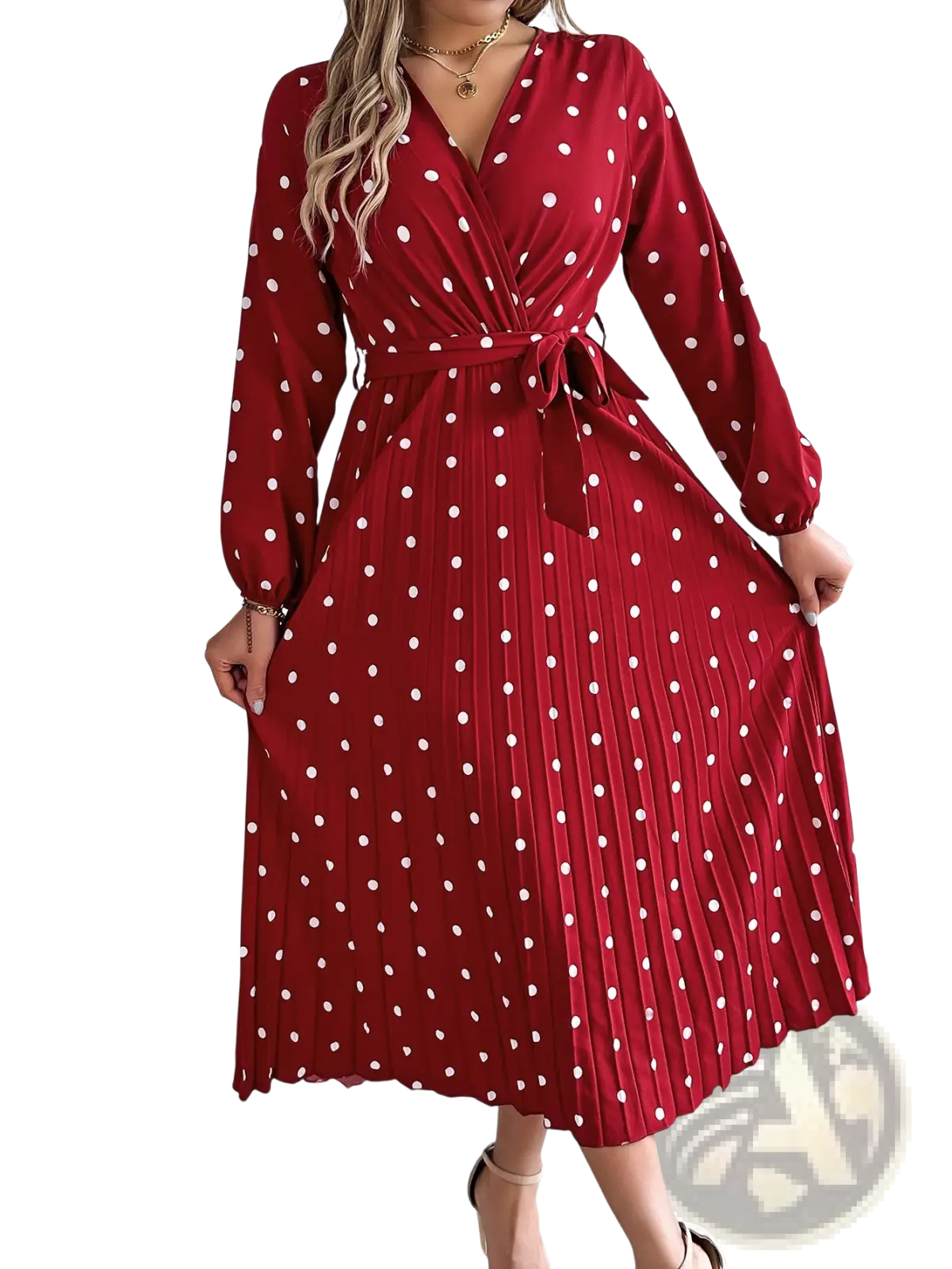 A red polka dot pleated midi dress with long sleeves and white dots featuring a v neck design
