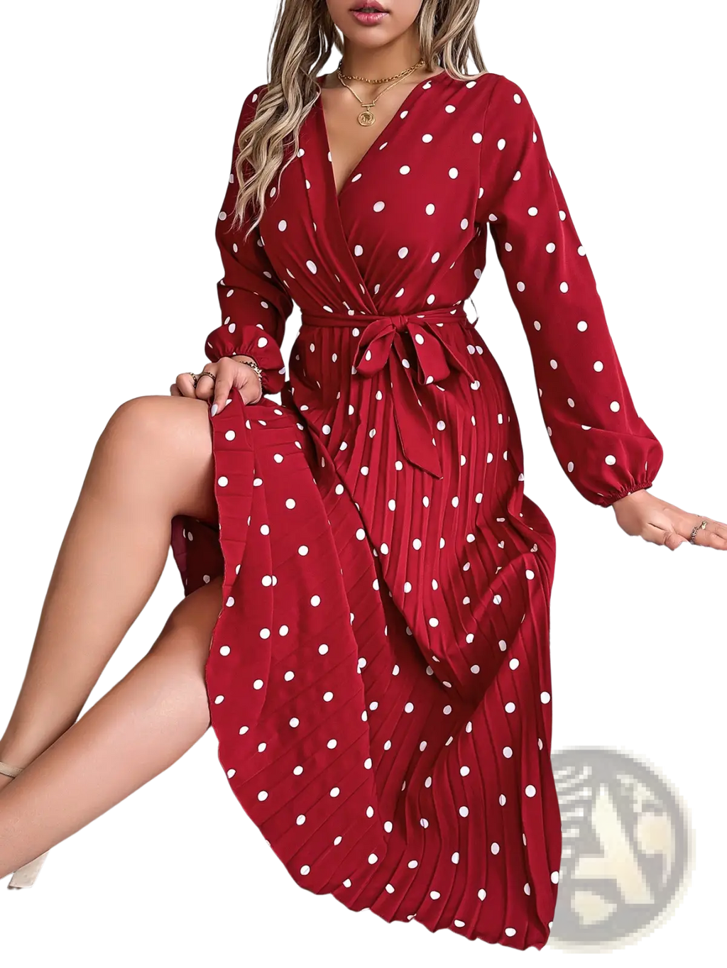 A red polka dot pleated v neck maxi dress with long sleeves and a wrap design in lightweight fabric