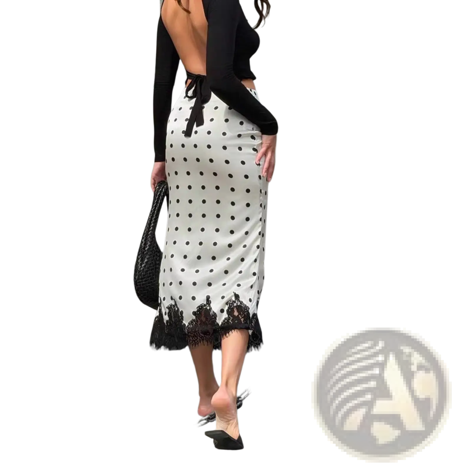 White satin midi skirt with black polka dots and lace trim at the hem perfect for elegant occasions