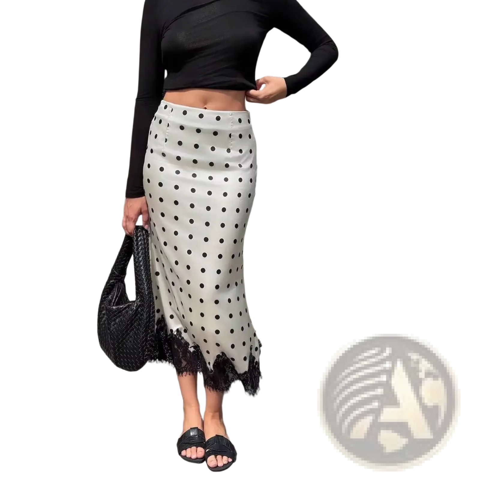 A white satin polka dot midi skirt with black dots and lace trim at the hem for elegant occasions